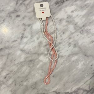 Kid’s size pink and white necklace